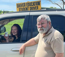 picture of norm stricker with a student